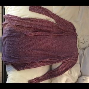 Red/white long sleeved cardigan.